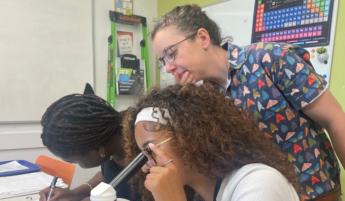 students doing science experiment