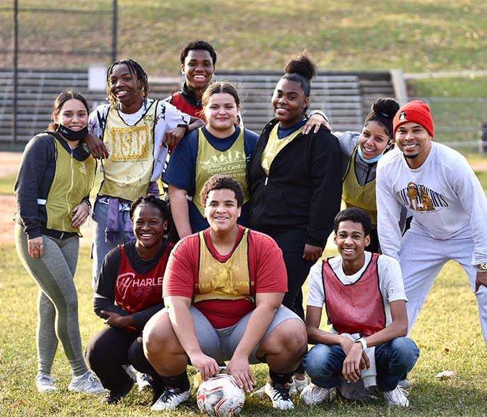 students in group photo for soccer